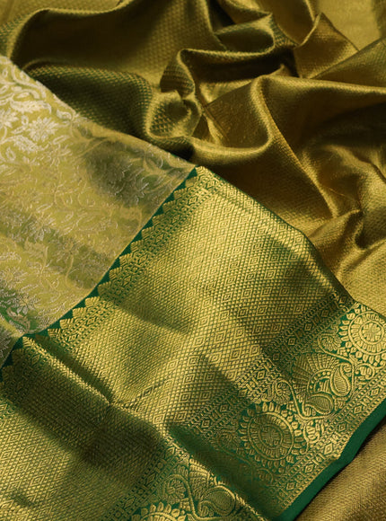 Pure kanchipuram tissue silk saree light green and green with allover zari woven brocade weaves and long rich zari woven border