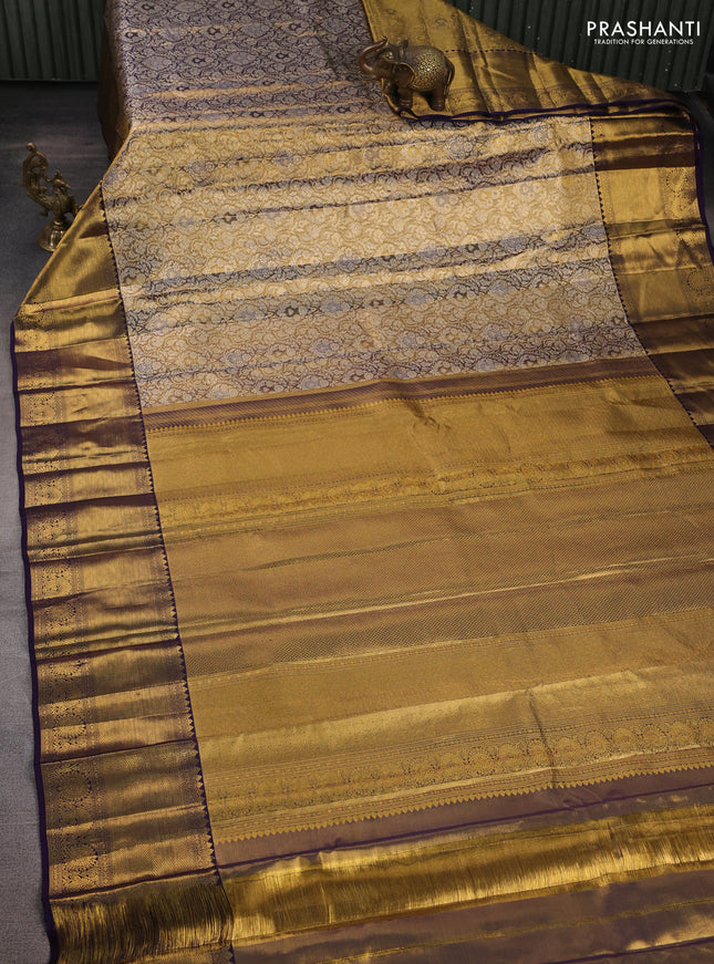 Pure kanchipuram tissue silk saree gold and navy blue with allover zari woven brocade weaves and long rich zari woven border