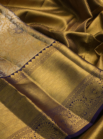 Pure kanchipuram tissue silk saree gold and navy blue with allover zari woven brocade weaves and long rich zari woven border