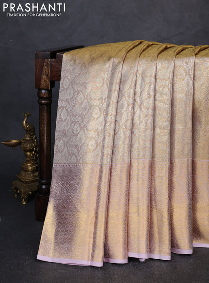 Pure kanchipuram tissue silk saree gold and pastel lavender with allover zari woven brocade weaves and long rich zari woven border