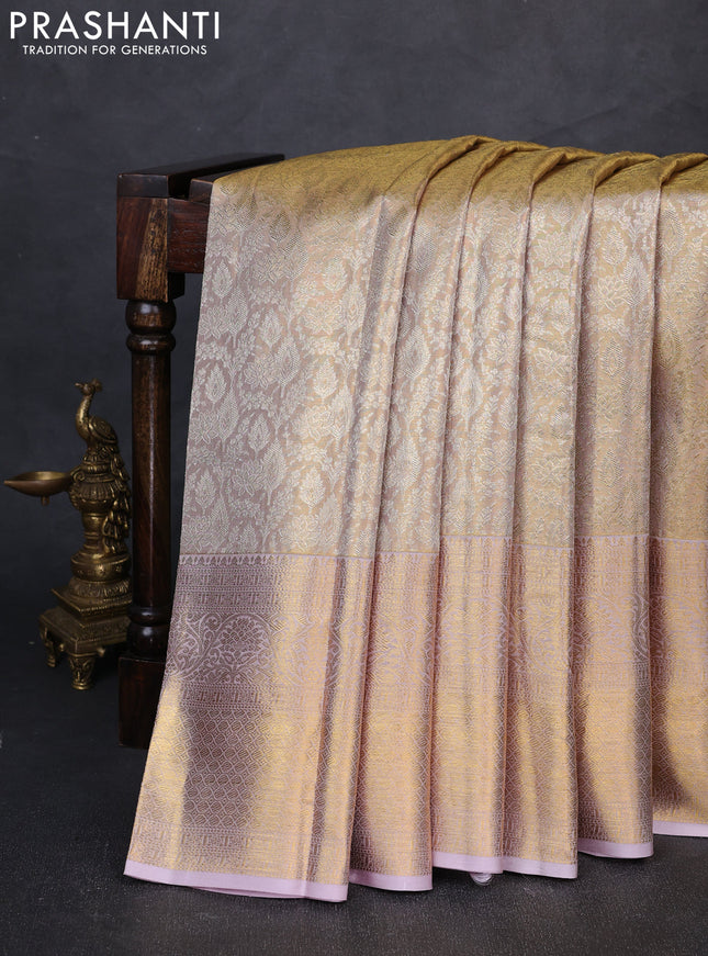 Pure kanchipuram tissue silk saree gold and pastel lavender with allover zari woven brocade weaves and long rich zari woven border