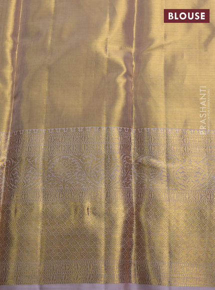 Pure kanchipuram tissue silk saree gold and pastel lavender with allover zari woven brocade weaves and long rich zari woven border