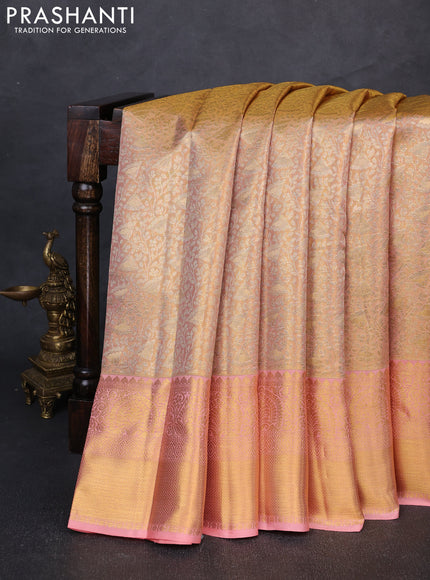 Pure kanchipuram tissue silk saree peach shade with allover zari woven brocade weaves and rich zari woven border