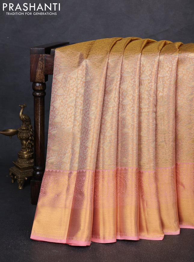 Pure kanchipuram tissue silk saree peach shade with allover zari woven brocade weaves and rich zari woven border