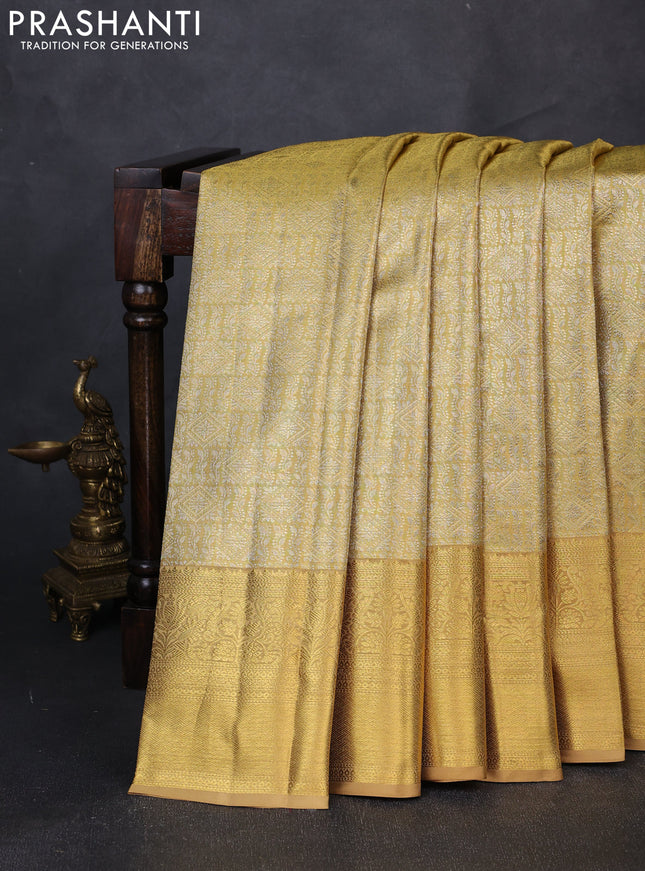 Pure kanchipuram tissue silk saree gold and sandal with allover zari woven brocade weaves and rich zari woven border