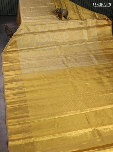 Pure kanchipuram tissue silk saree gold and sandal with allover zari woven brocade weaves and rich zari woven border