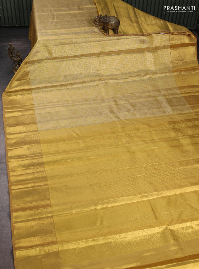 Pure kanchipuram tissue silk saree gold and sandal with allover zari woven brocade weaves and rich zari woven border