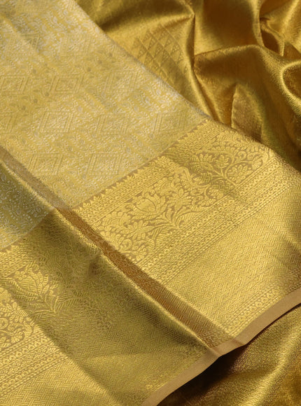 Pure kanchipuram tissue silk saree gold and sandal with allover zari woven brocade weaves and rich zari woven border