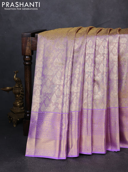 Pure kanchipuram tissue silk saree dual shade of lavender with allover zari woven brocade weaves and rich zari woven border