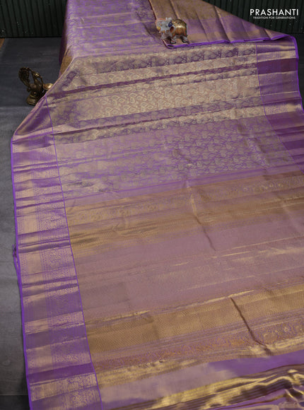 Pure kanchipuram tissue silk saree dual shade of lavender with allover zari woven brocade weaves and rich zari woven border