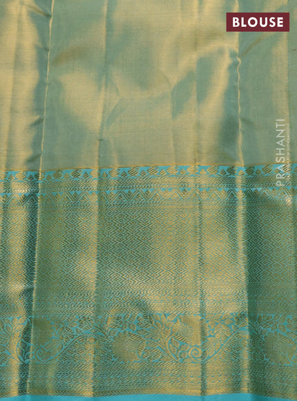 Pure kanchipuram tissue silk saree dual shade of teal with allover zari woven brocade weaves and rich zari woven border