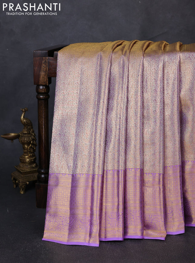 Pure kanchipuram tissue silk saree golden lavender with allover zari woven geometric brocade weaves and rich zari woven border