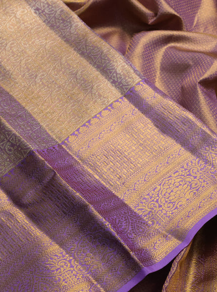 Pure kanchipuram tissue silk saree golden lavender with allover zari woven geometric brocade weaves and rich zari woven border
