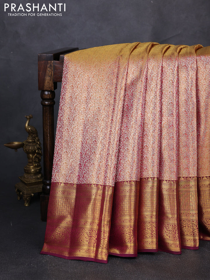Pure kanchipuram tissue silk saree dual shade of gold and wine shade with allover zari woven geometric brocade weaves and rich zari woven border
