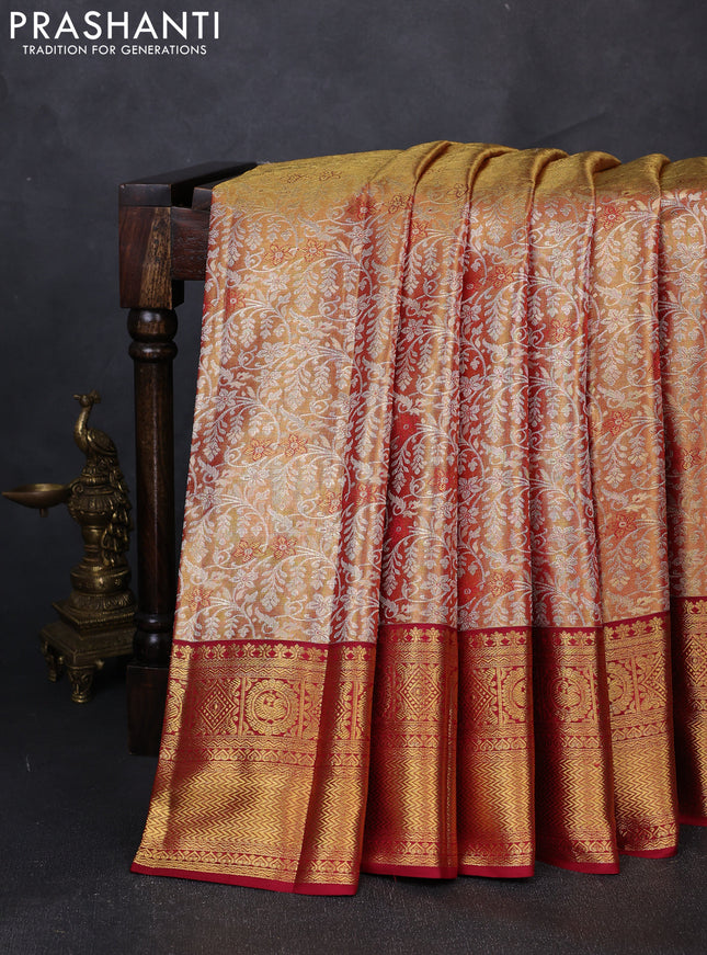 Pure kanchipuram tissue silk saree dual shade of gold and maroon with allover zari woven brocade weaves and rich zari woven border