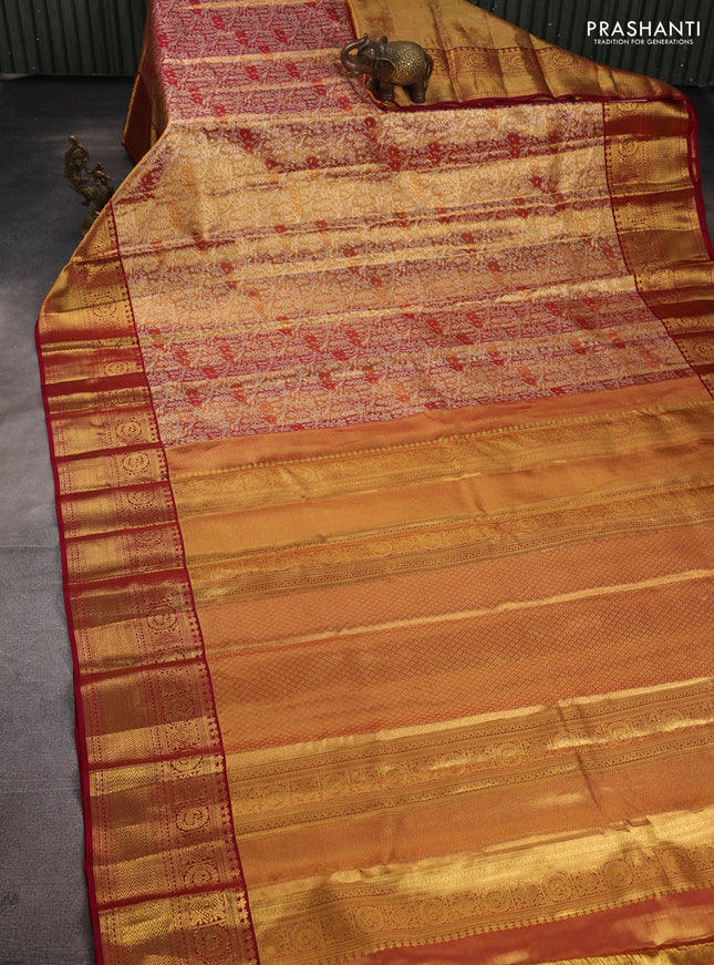 Pure kanchipuram tissue silk saree dual shade of gold and maroon with allover zari woven brocade weaves and rich zari woven border