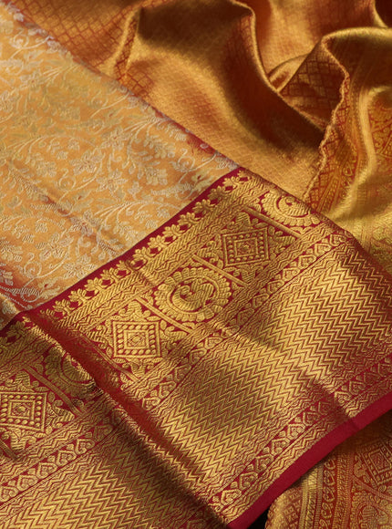Pure kanchipuram tissue silk saree dual shade of gold and maroon with allover zari woven brocade weaves and rich zari woven border
