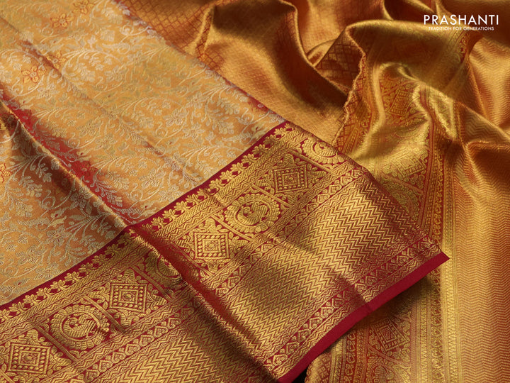 Pure kanchipuram tissue silk saree dual shade of gold and maroon with allover zari woven brocade weaves and rich zari woven border