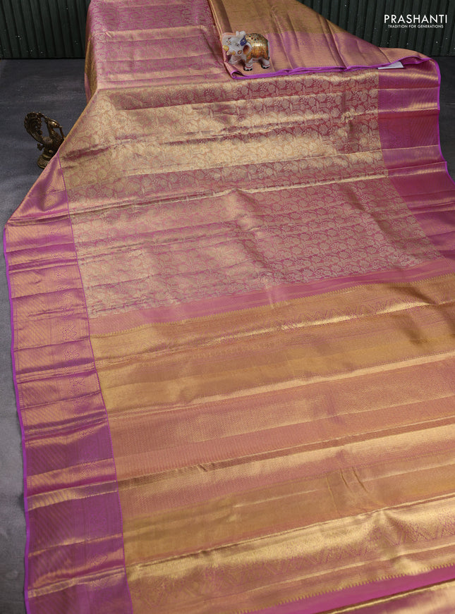 Pure kanchipuram tissue silk saree dual shade of mild lavender and lavender with allover zari woven brocade weaves and rich zari woven border