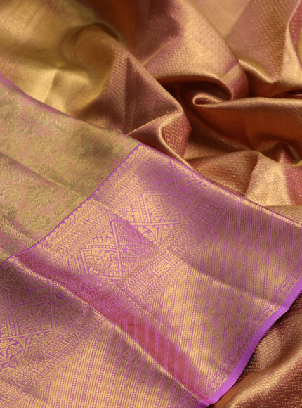 Pure kanchipuram tissue silk saree dual shade of mild lavender and lavender with allover zari woven brocade weaves and rich zari woven border