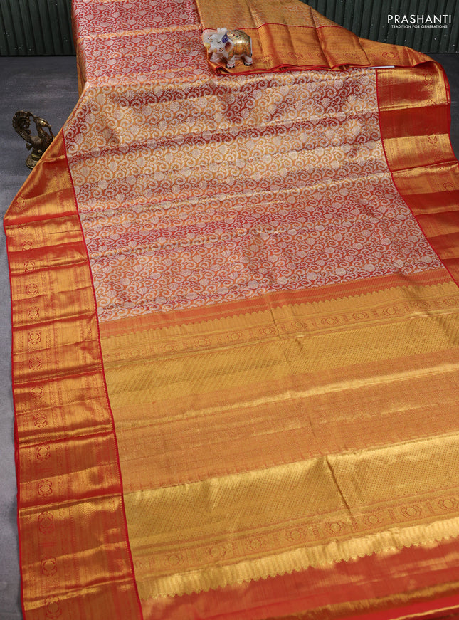 Pure kanchipuram tissue silk saree dual shade of golden red and red with allover silver zari woven brocade weaves and long rich zari woven border