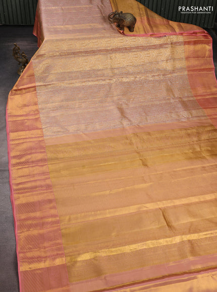 Pure kanchipuram tissue silk saree dual shade of peach with allover zari woven brocade weaves and rich zari woven border