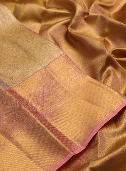 Pure kanchipuram tissue silk saree dual shade of peach with allover zari woven brocade weaves and rich zari woven border