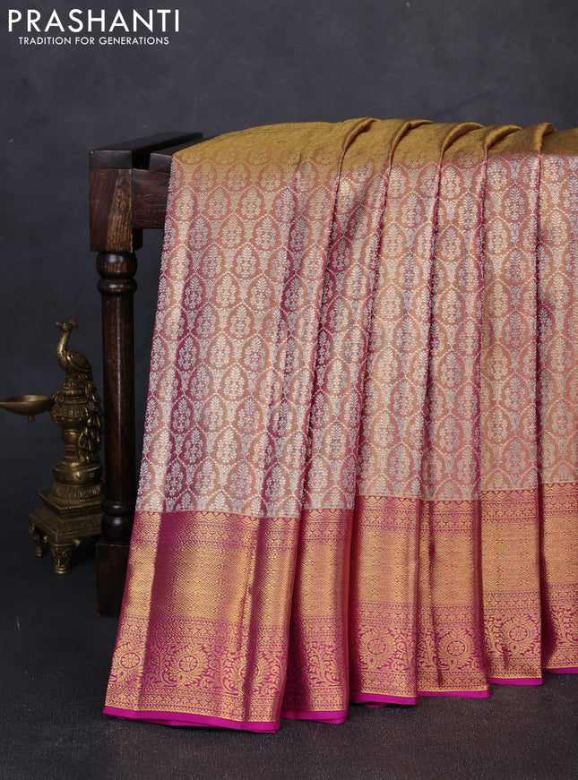 Pure kanchipuram tissue silk saree dual shade of golden pink and magenta pink with allover zari woven brocade weaves and rich zari woven border