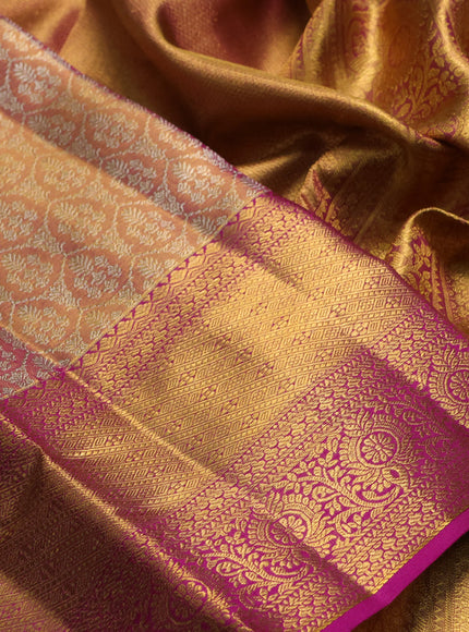 Pure kanchipuram tissue silk saree dual shade of golden pink and magenta pink with allover zari woven brocade weaves and rich zari woven border