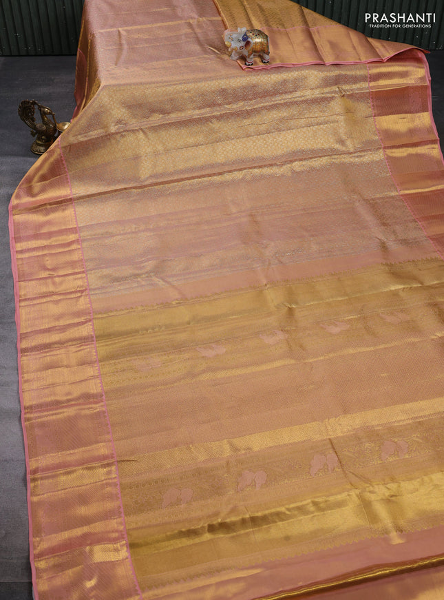 Pure kanchipuram tissue silk saree dual shade of peach with allover zari woven brocade weaves and rich zari woven border