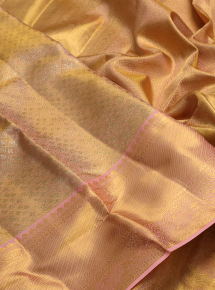 Pure kanchipuram tissue silk saree dual shade of peach with allover zari woven brocade weaves and rich zari woven border