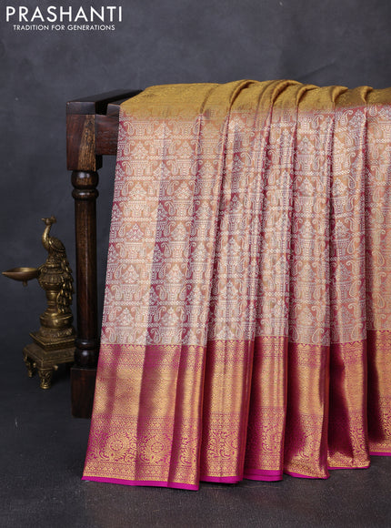 Pure kanchipuram tissue silk saree dual shade of golden pink and magenta pink with allover zari woven brocade weaves and rich zari woven border