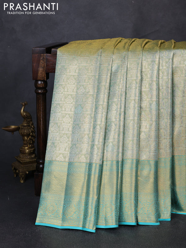 Pure kanchipuram tissue silk saree dual shade of teal and teal blue with allover zari woven brocade weaves and rich zari woven border