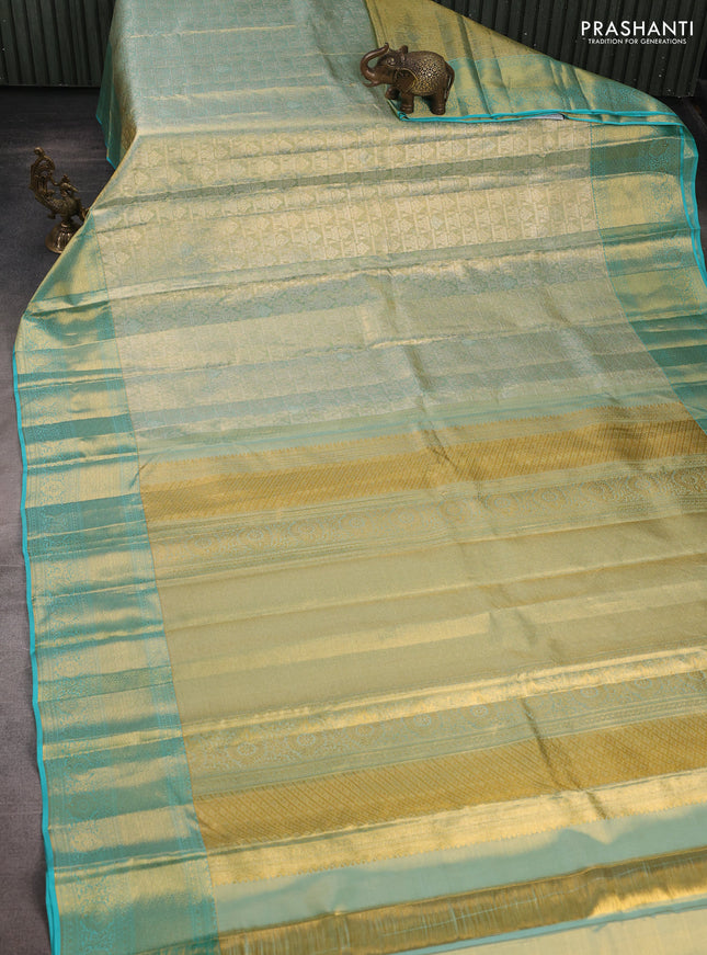 Pure kanchipuram tissue silk saree dual shade of teal and teal blue with allover zari woven brocade weaves and rich zari woven border