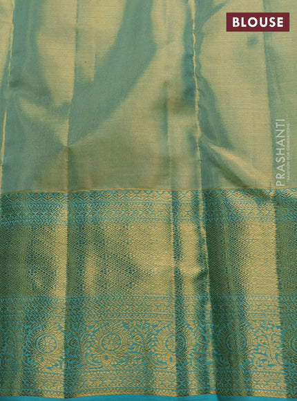Pure kanchipuram tissue silk saree dual shade of teal and teal blue with allover zari woven brocade weaves and rich zari woven border