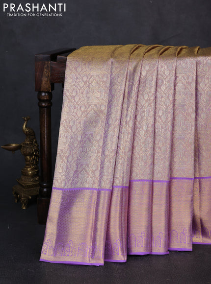 Pure kanchipuram tissue silk saree dual shade of mild lavender and lavender with allover zari woven brocade weaves and rich zari woven border