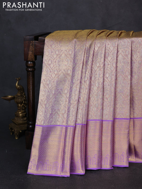 Pure kanchipuram tissue silk saree dual shade of mild lavender and lavender with allover zari woven brocade weaves and rich zari woven border