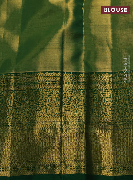 Pure kanchipuram tissue silk saree light green and green with allover zari woven brocade weaves and rich zari woven border