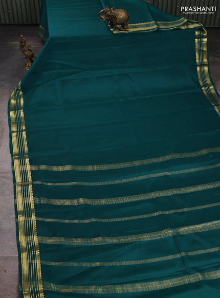Pure mysore silk saree peacock green with plain body and zari woven border