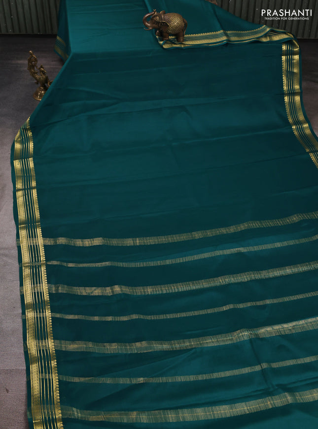 Pure mysore silk saree peacock green with plain body and zari woven border