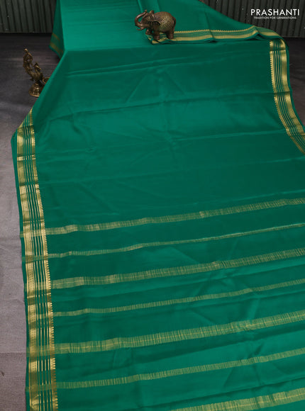Pure mysore silk saree green with plain body and zari woven border