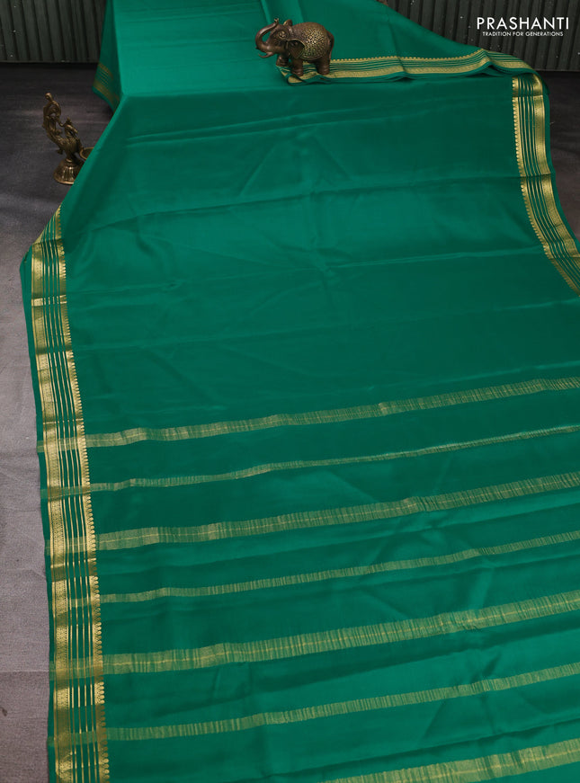 Pure mysore silk saree green with plain body and zari woven border