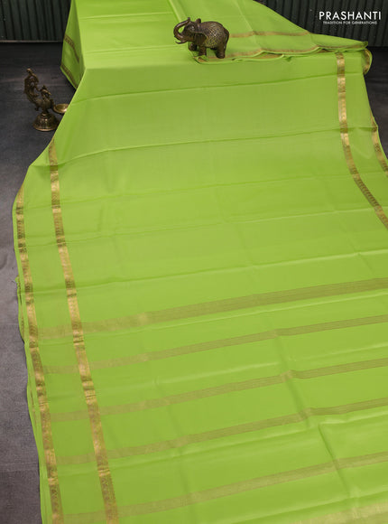 Pure mysore silk saree lime green with plain body and rettapet zari woven border