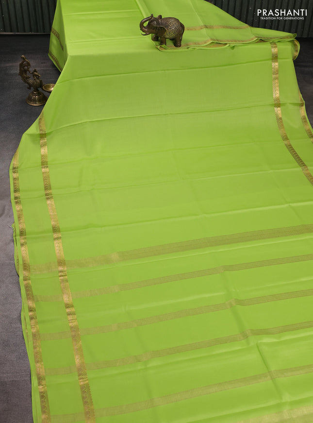 Pure mysore silk saree lime green with plain body and rettapet zari woven border