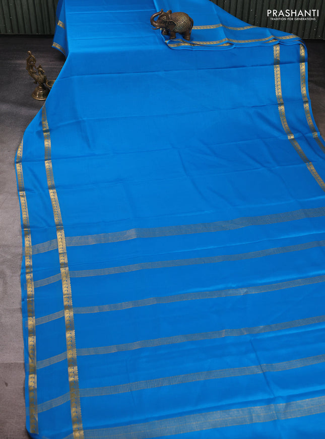 Pure mysore silk saree cs blue with plain body and rettapet zari woven border