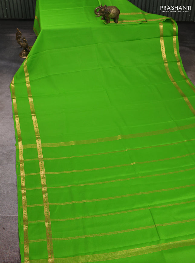 Pure mysore silk saree parrot green with plain body and rettapet zari woven border