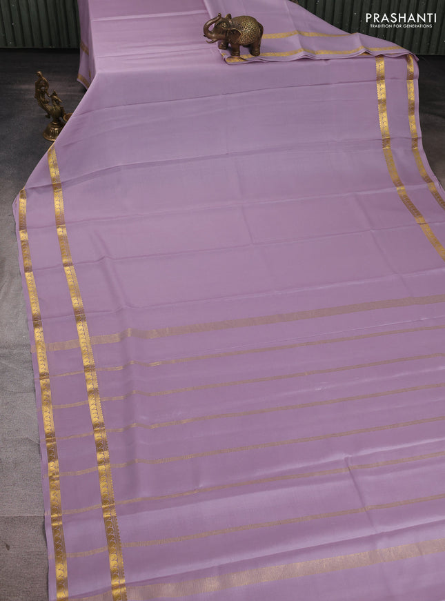 Pure mysore silk saree pastel lavender with plain body and rettapet zari woven border