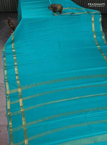 Pure mysore silk saree teal blue with plain body and rettapet zari woven border