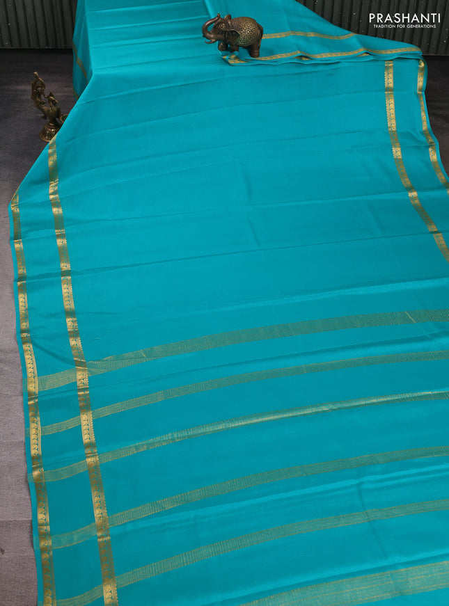 Pure mysore silk saree teal blue with plain body and rettapet zari woven border