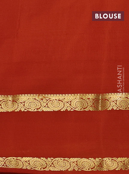 Pure mysore silk saree rust shade with allover zari woven buttas and rettapet zari woven border